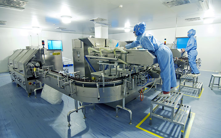Sterile compounding pharmacy IV preparation room — primary engineering controls and environmental monitoring under one Allometrics program