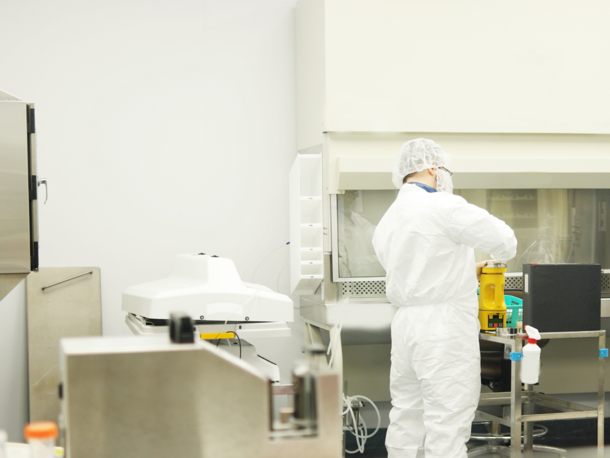 Allometrics technician in cleanroom