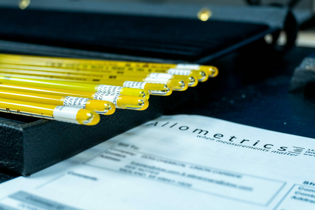 Allometrics-branded liquid-in-glass thermometers with calibration paperwork